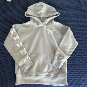 Girls Abercrombie light blue sweatshirt with butterfly designs